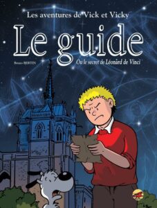 Couverture de la BD Vick et Vicky "Le Guide" où Vick (garçon blond habillé en rouge) et son chien blanc Vicky examinent un vieux parchemin, devant un château, en pleine nuit.