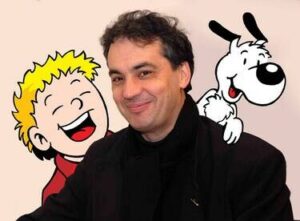 L'auteur de BD Bruno Bertin avec ses personnages VIck (garçon blond habillé en rouge) et Vicky (petit chien blanc).